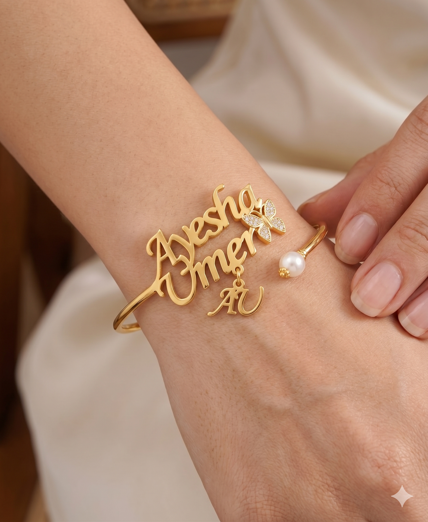
                  
                    Personalized Gold Name Bangle – Elegant Custom Bracelet with Pearl Accent
                  
                