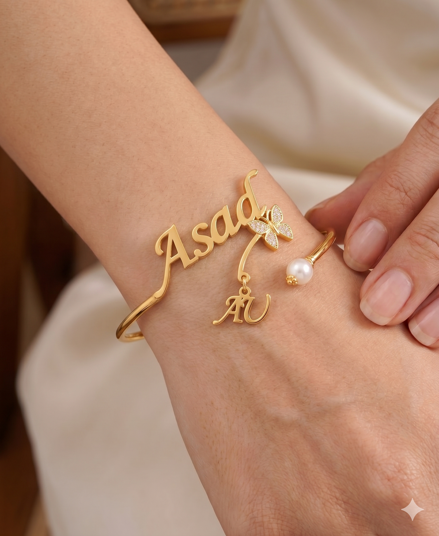 
                  
                    Personalized Gold Name Bangle – Elegant Custom Bracelet with Pearl Accent
                  
                