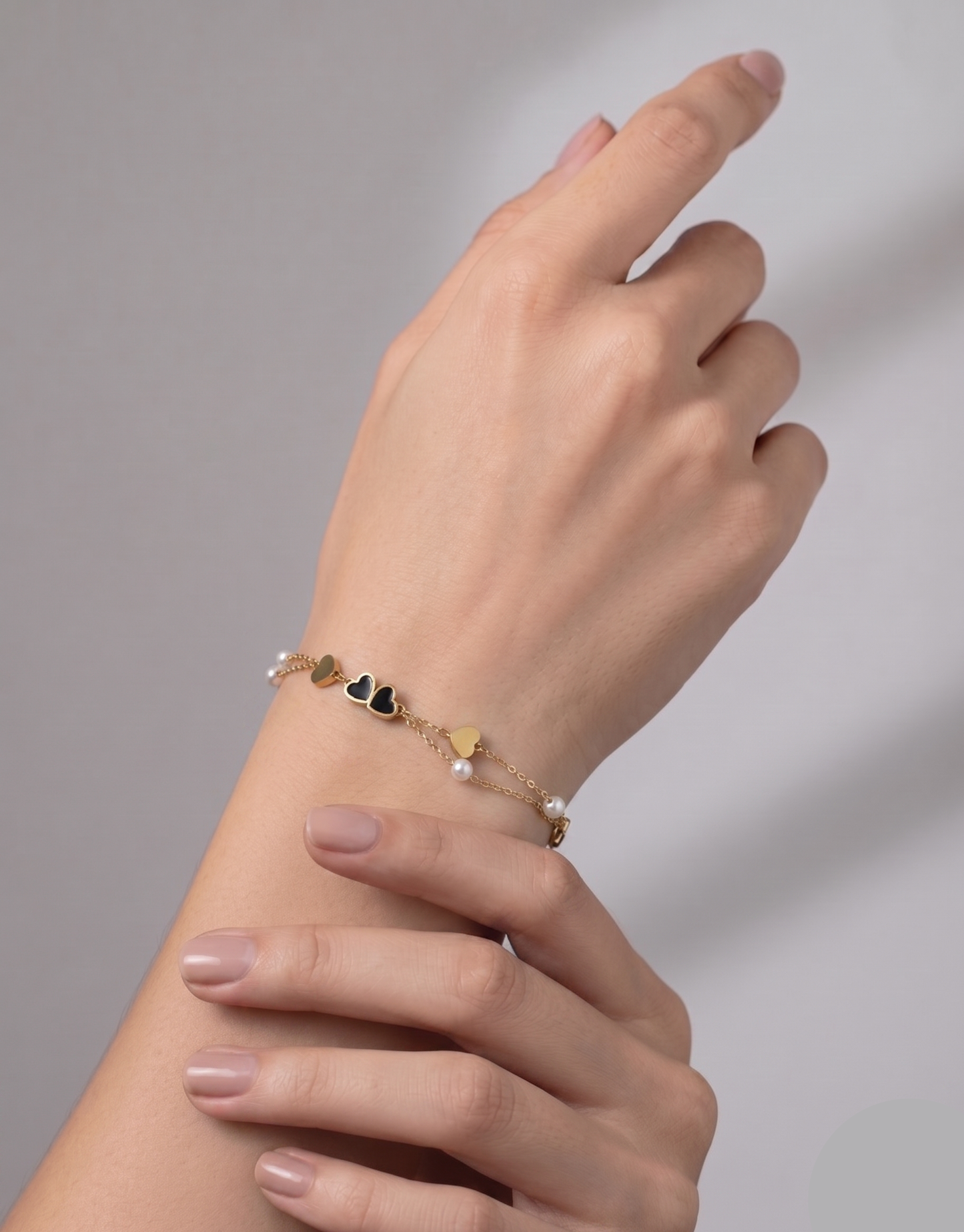 
                  
                    Double Layer Stainless Steel Heart Bracelet - Black Enamel & Pearl Charm Wrist Accent
                  
                